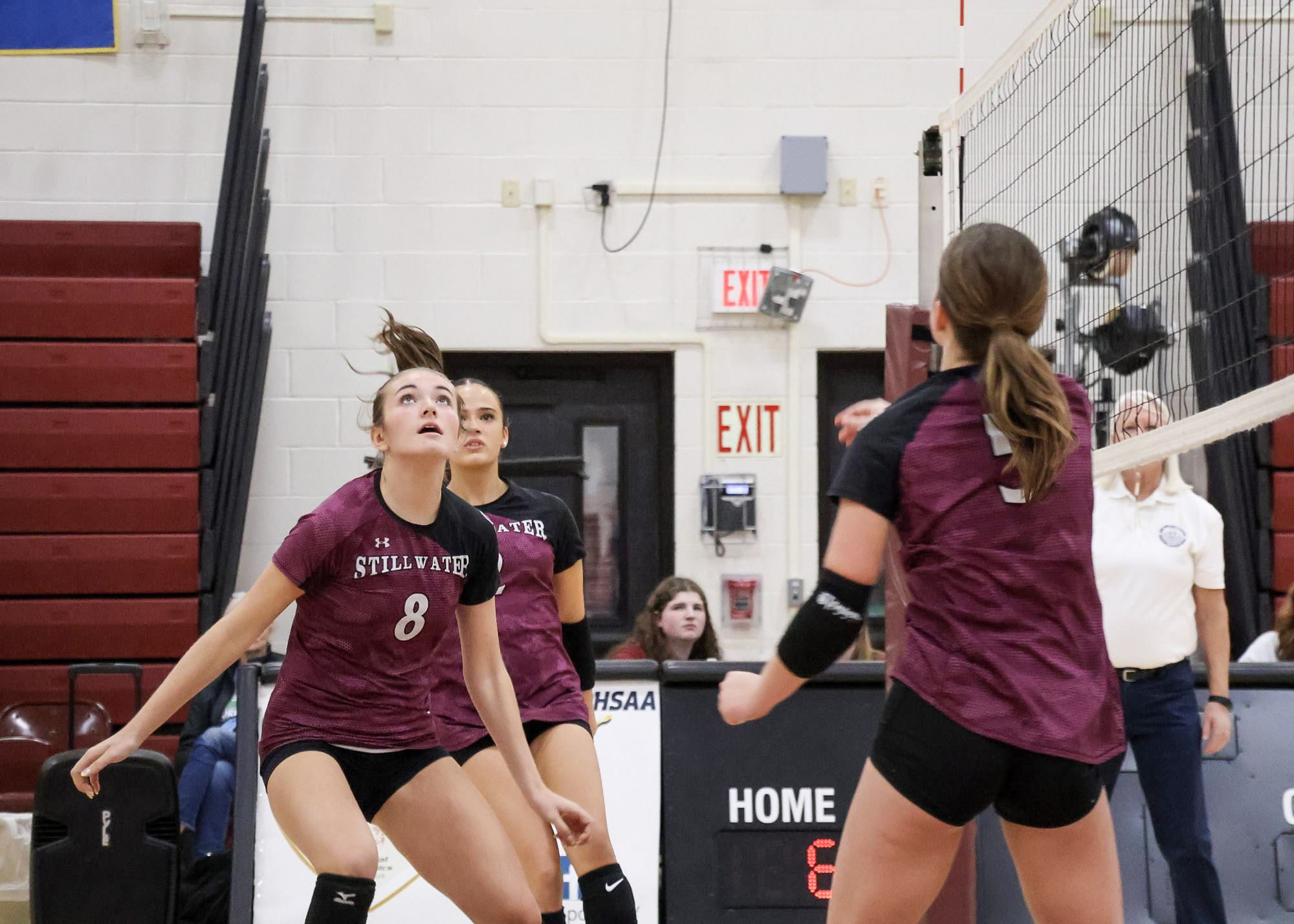 cheerleaders cheering in gymnasium