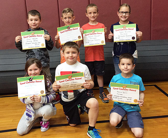 2nd graders pose with their Character Education Leader Awards