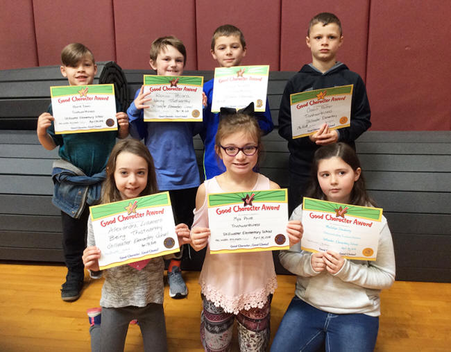 2nd graders pose with their Character Education Leader Awards