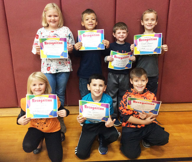 2nd graders pose with their Character Education Leader Awards