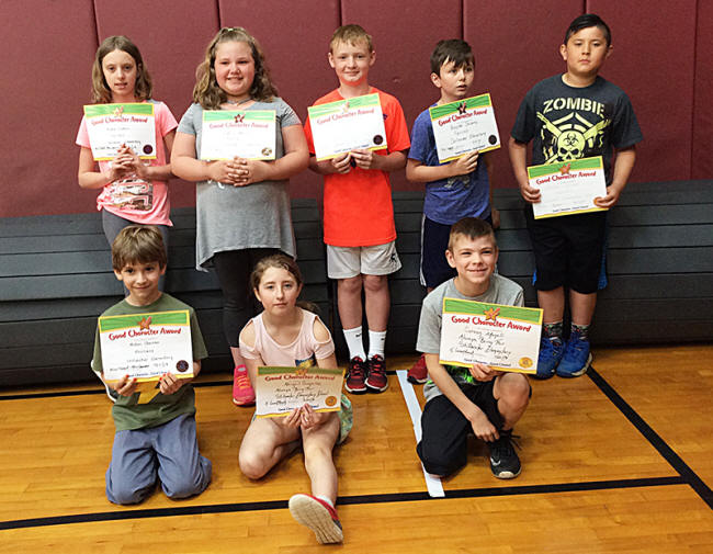 3rd graders pose with their Character Education Leader Awards