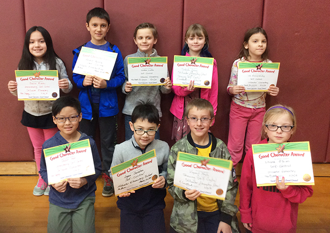 3rd graders pose with their Character Education Leader Awards