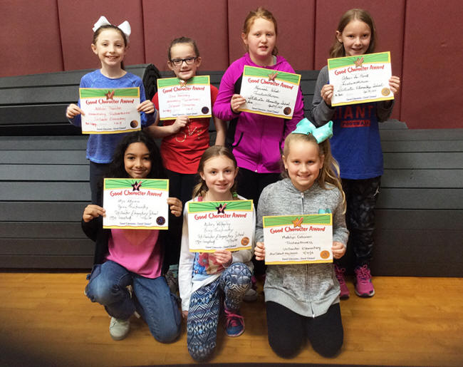 3rd graders pose with their Character Education Leader Awards