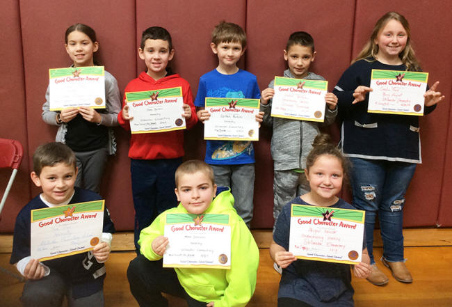 3rd graders pose with their Character Education Leader Awards