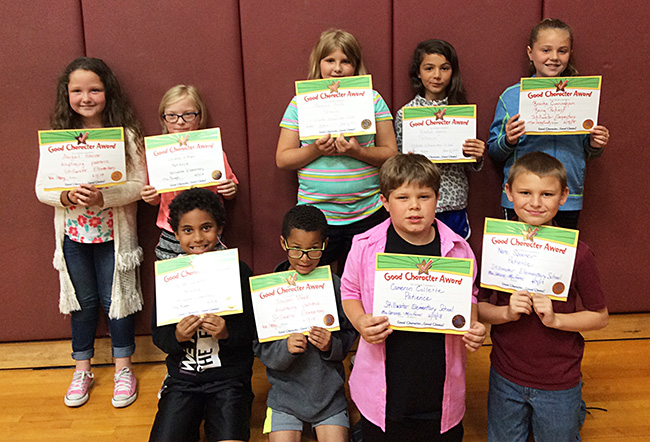 3rd graders pose with their Character Education Leader Awards