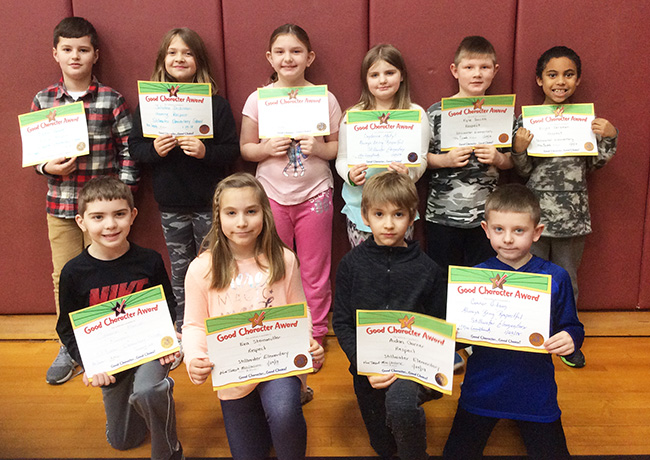 3rd graders pose with their Character Education Leader Awards