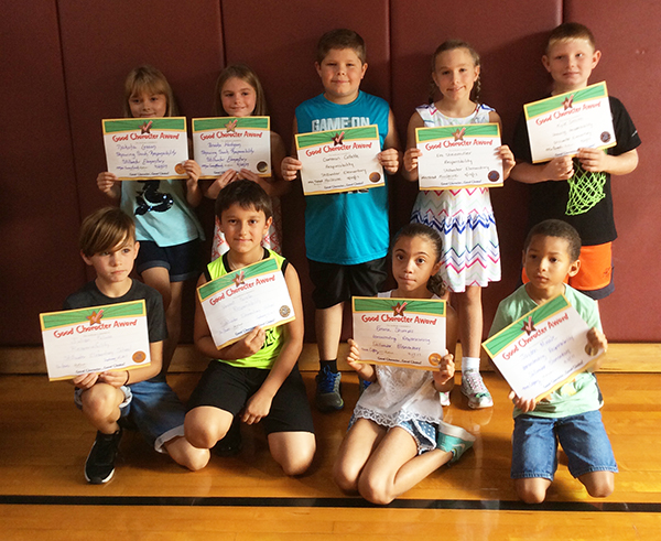 3rd graders pose with their Character Education Leader Awards