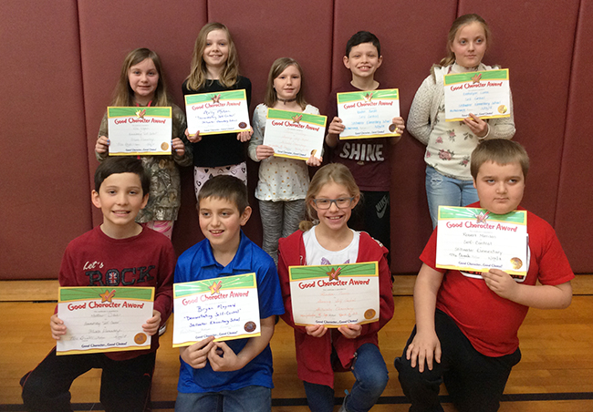 4th graders pose with their Character Education Leader Awards