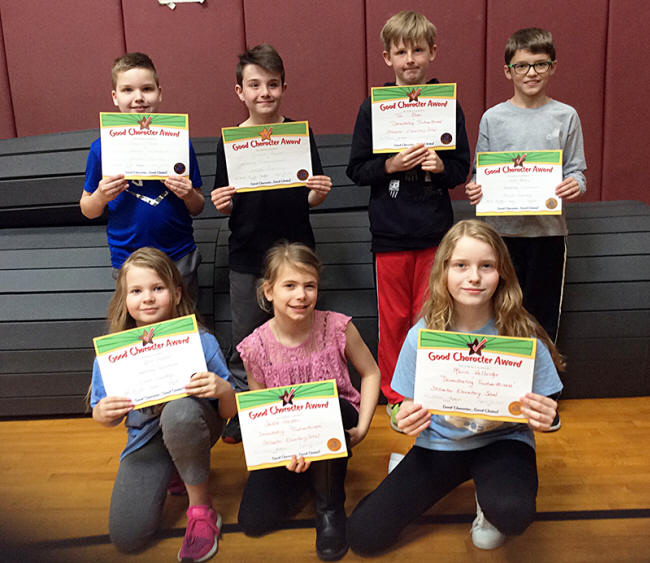 4th graders pose with their Character Education Leader Awards