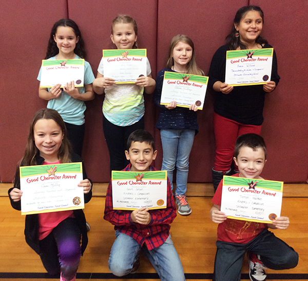 4th graders pose with their Character Education Leader Awards