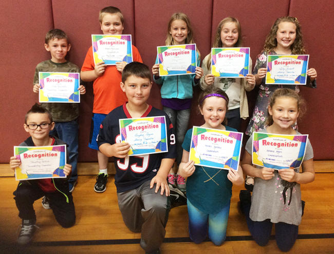 4th graders pose with their Character Education Leader Awards