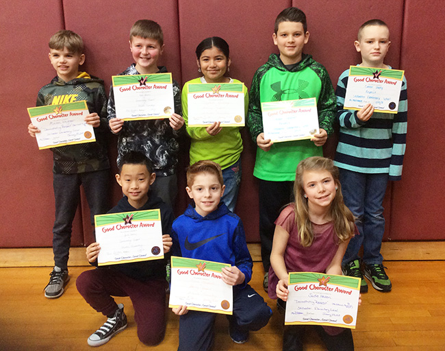 4th graders pose with their Character Education Leader Awards