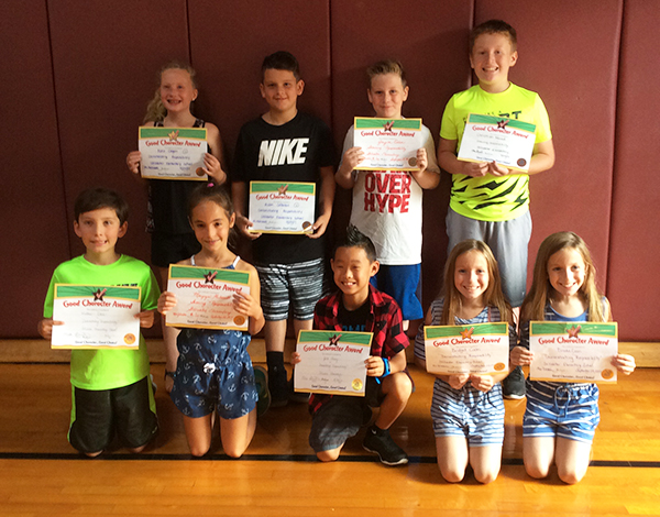 4th graders pose with their Character Education Leader Awards