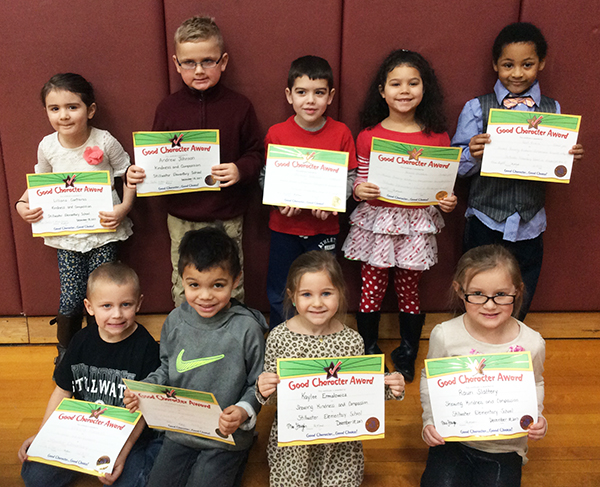 Kindergartners pose with their Character Education Leader Awards