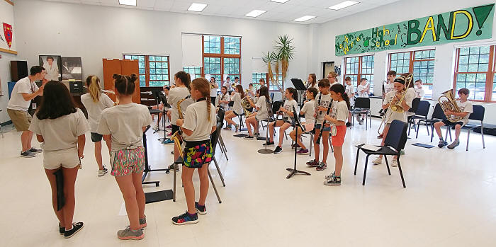 The 5th grade band practices for the Trills and Thrills Music Festival