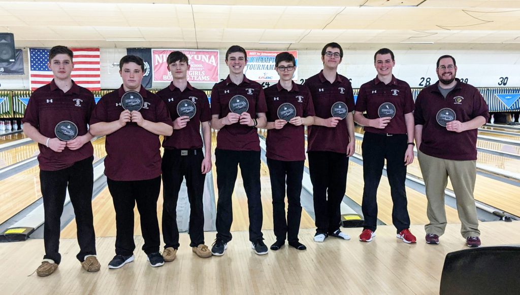 Bowling team lined up with their sectional patches