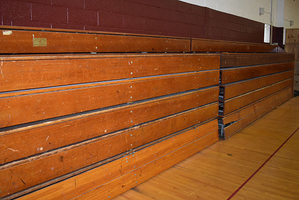 bleachers showing cracked wood