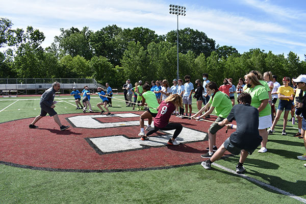 students playing tug of war