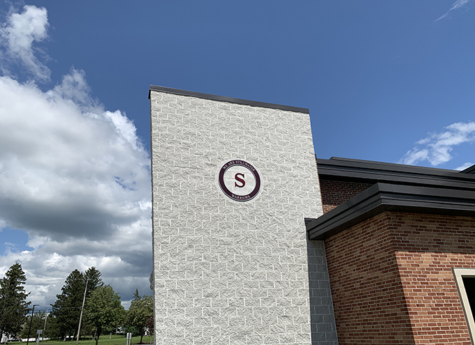 Warriors sign and logo on high school