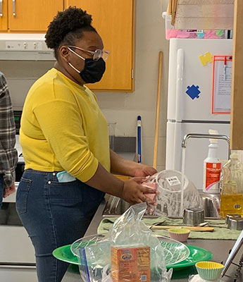 student in kitchen