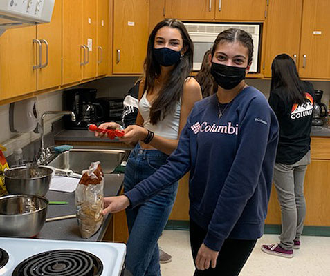 students in kitchen