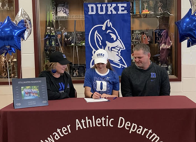 Gianna Locci with family at Duke track & field signing