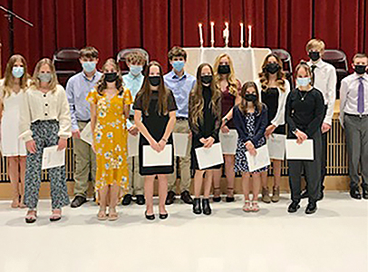 students standing as a group with MS principal