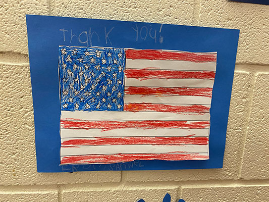 student-created flag on wall