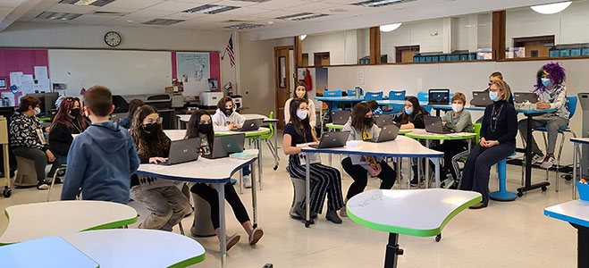 students holding a mock trial in makerspace room