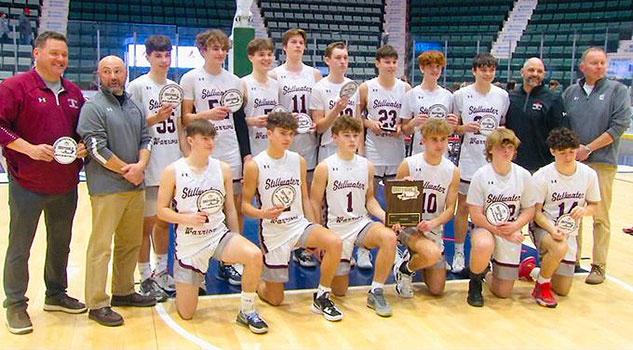 basketball team with coaches, holding awards