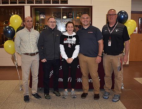 Lexi with her coaches 