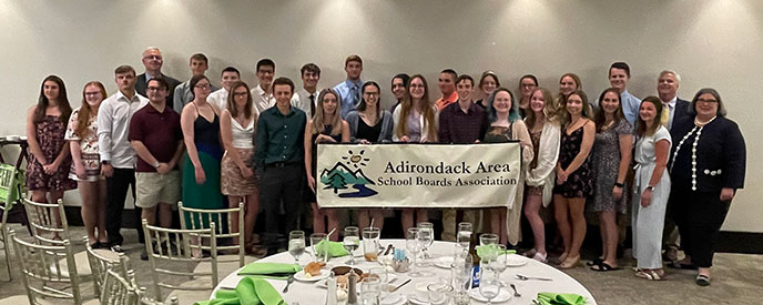 group of students and adults at the awards event