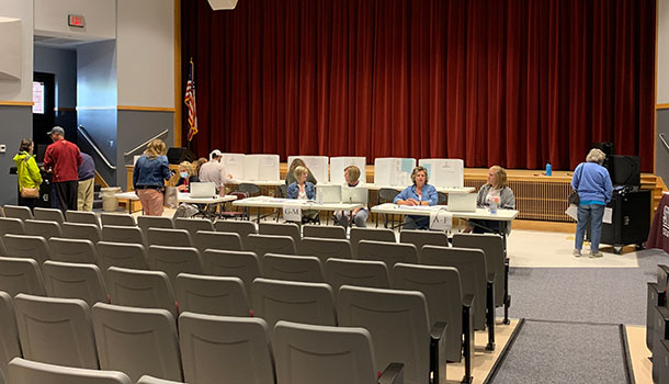 Voters casting their ballots in the Stillwater auditorium on May 17.