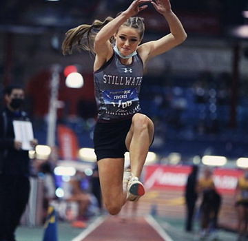 Gianna jumping, airborne