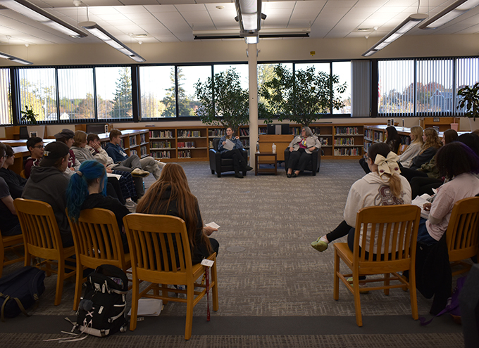 Students interviewing Carrie Woerner