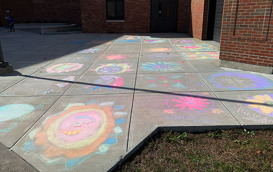 view of rangolis in front of the school entrance