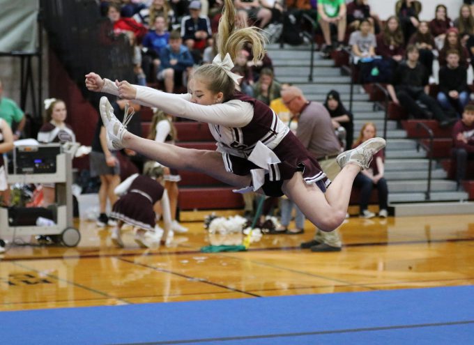cheerleader leaping in the air