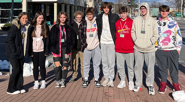 students standing in a group in Lake George Village