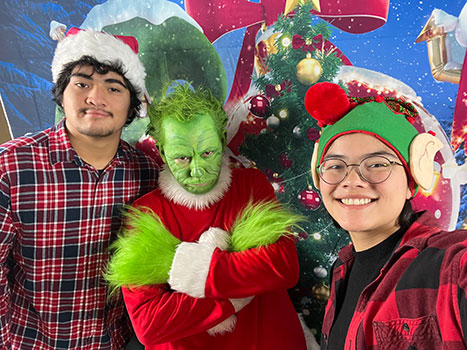 2 students with the Grinch