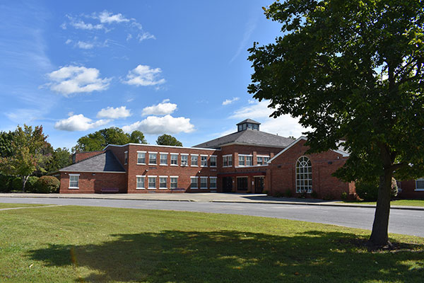 Stillwater Elementary School building during the summer