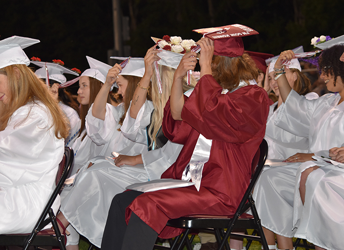 graduates turning their tassels