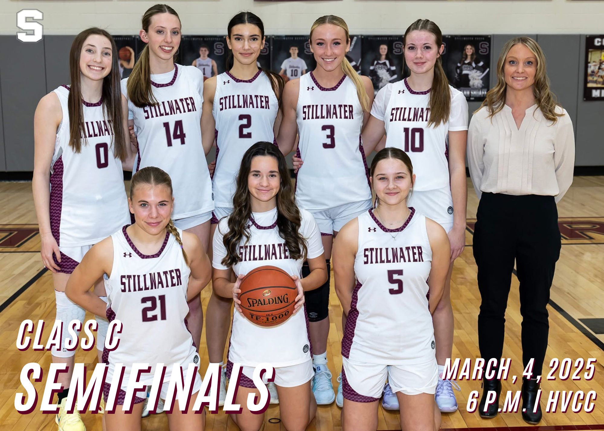 Group of Stillwater Athletes posing while one holds a Basketball for the Class C Semifinals.