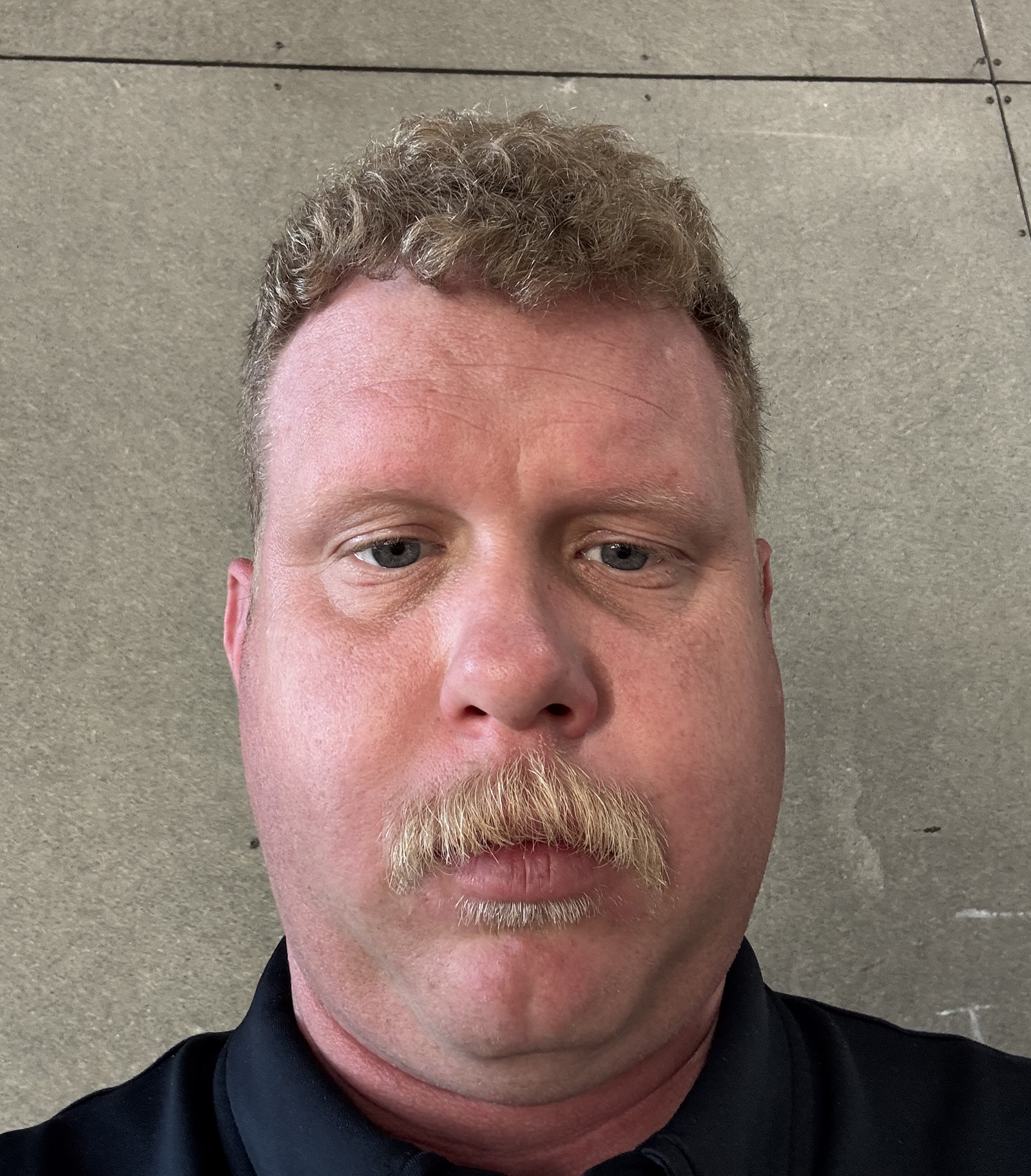 John Hoogeveen staring at the camera.