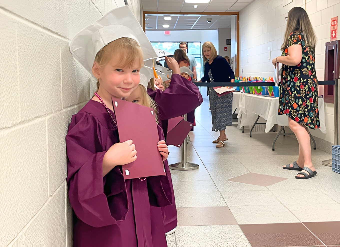 young student dressed up for kindergarten graduation