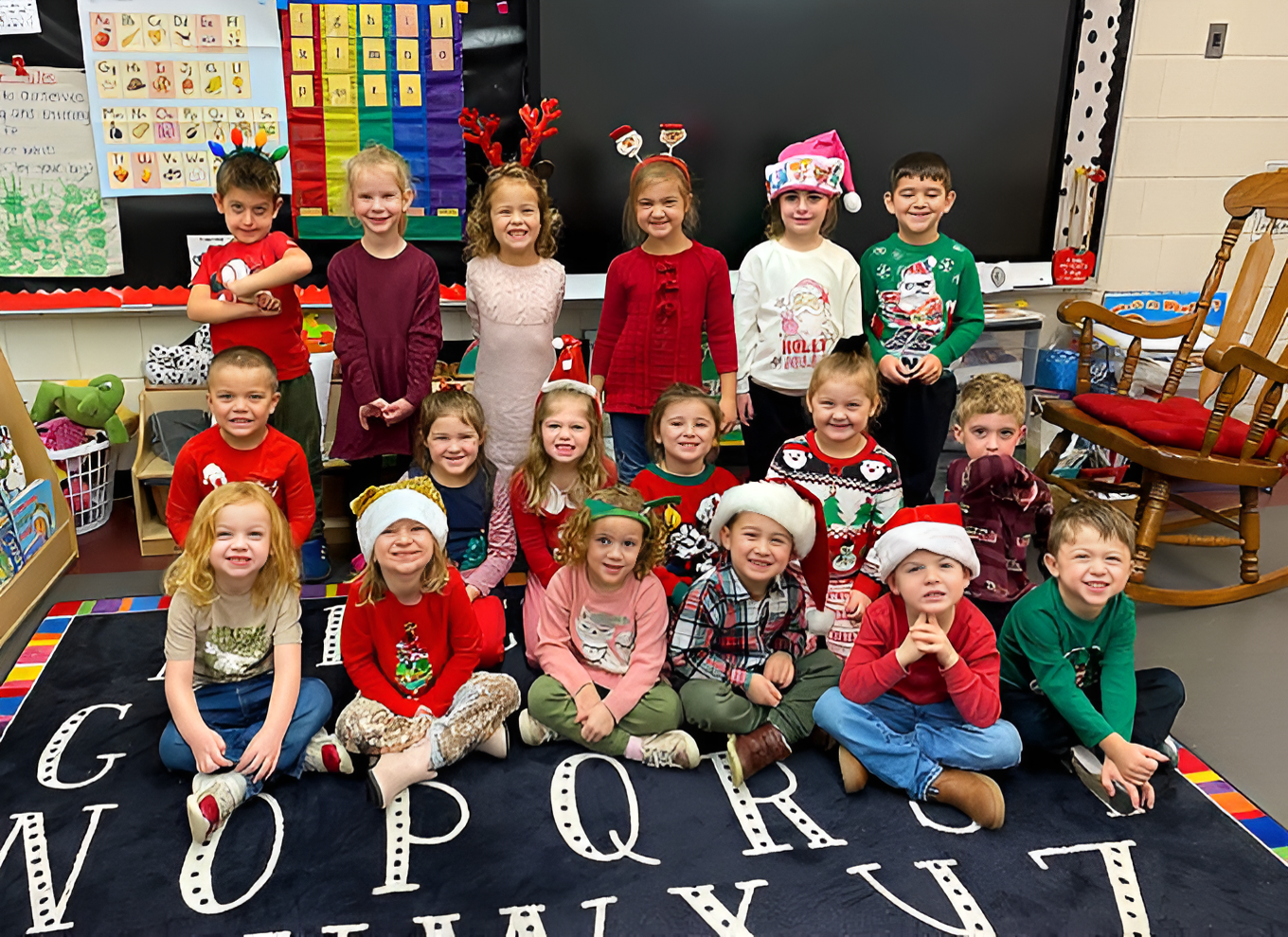 young students celebrating christmas