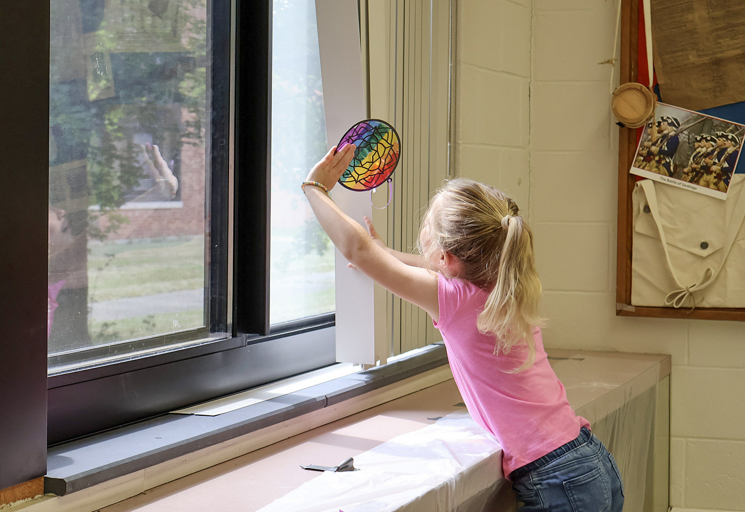 young students decorating christmas stuff