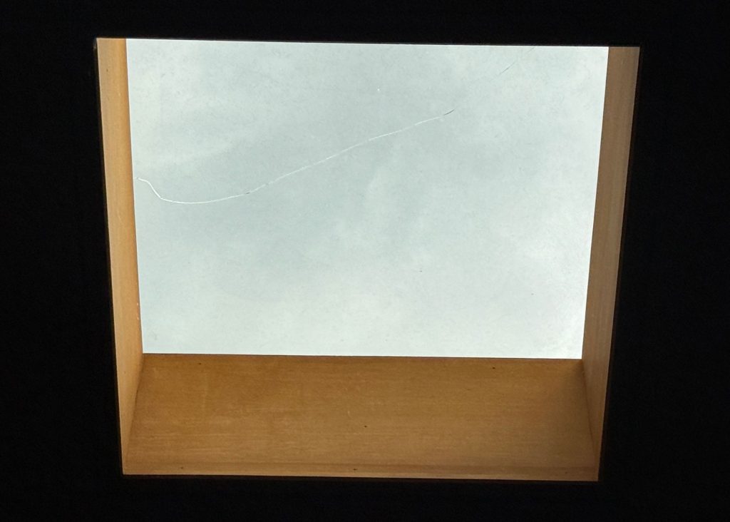 Skylight with a long crack horizontally through the middle.