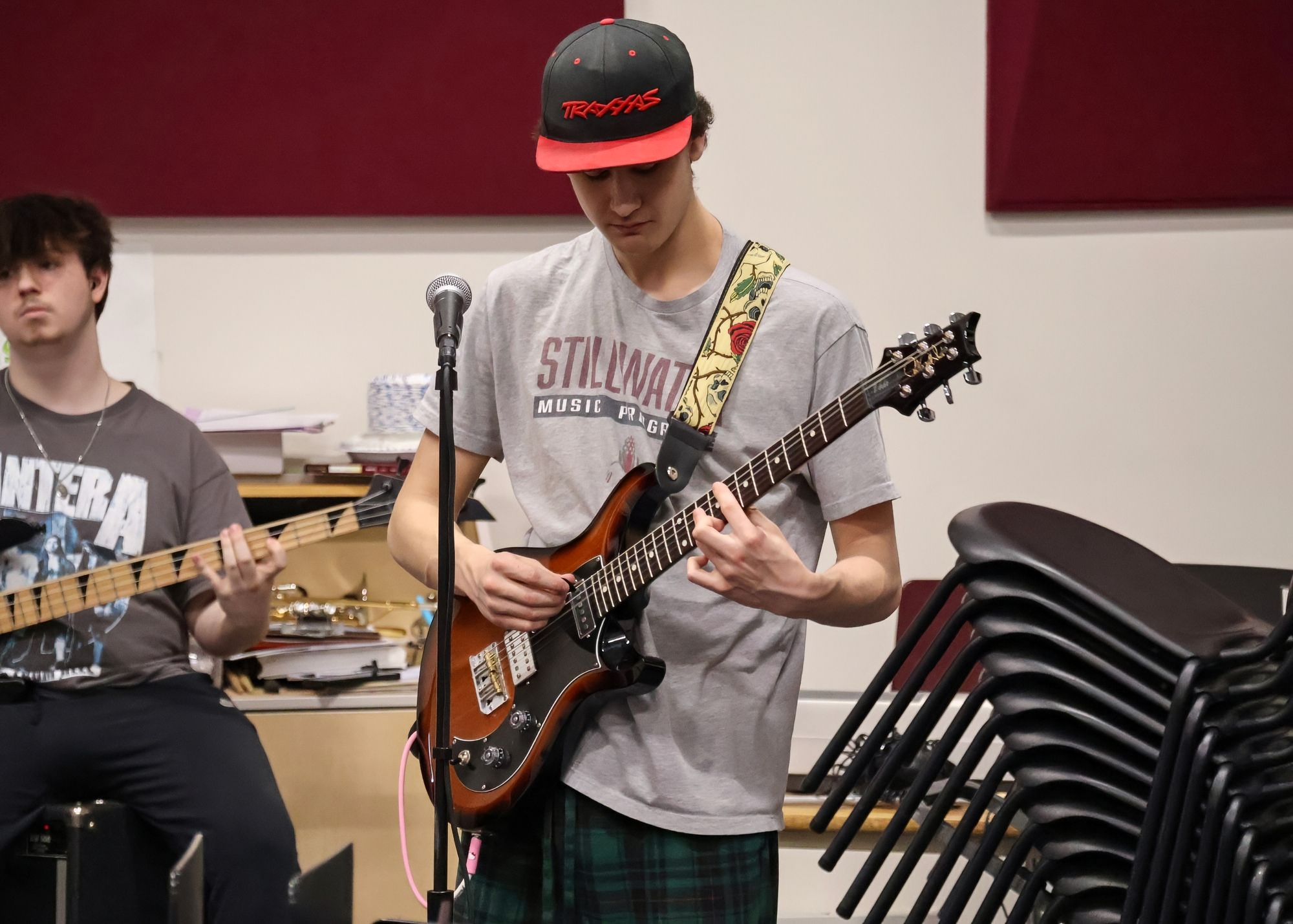 student receiving diploma during graduatin